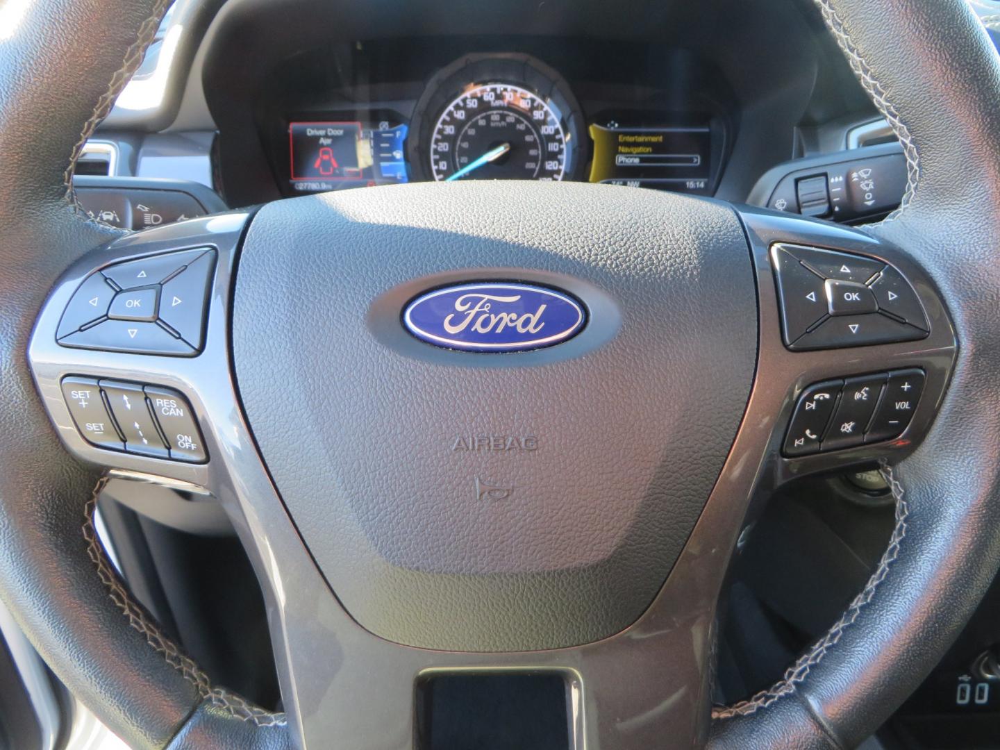 2019 White /Black Ford Ranger Lariat (1FTER4FHXKL) with an 2.3L engine, automatic transmission, located at 2630 Grass Valley Highway, Auburn, CA, 95603, (530) 508-5100, 38.937893, -121.095482 - Features a Fabtech suspension system, Fuel Offroad wheels, Nitto Ridge Grappler tires, Westin Running boards, and a Bakflip. - Photo#27